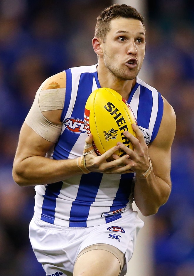 AFL 2015 Rd 16 - North Melbourne v Essendon MELBOURNE, AUSTRALIA - JULY 17: Aaron Black of the Kangaroos marks the ball during the 2015 AFL round 16 match between the North Melbourne Kangaroos and the Essendon Bombers at Etihad Stadium, Melbourne, Australia on July 17, 2015. (Photo by Adam Trafford/AFL Media)